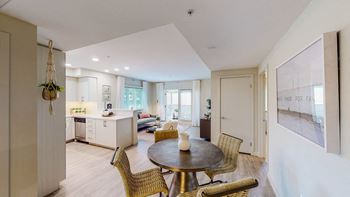 a kitchen and dining room with a table and chairs at Chase Knolls, Sherman Oaks, CA